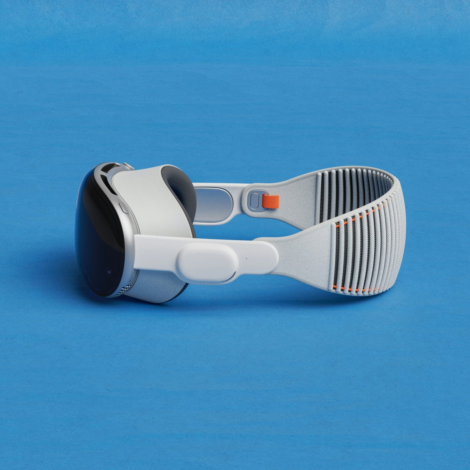 a pair of google glasses on a blue surface